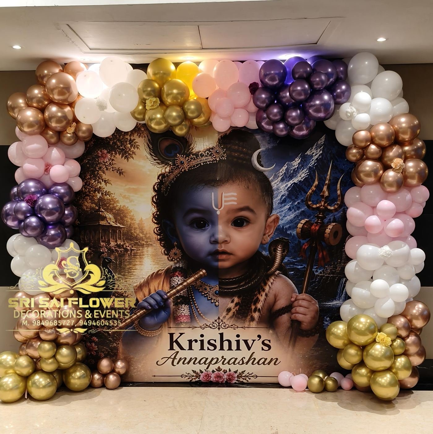 Pastel balloon arch decoration for a baby's Annaprashan ceremony